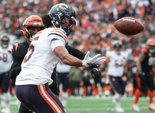 Bears wide receiver Rome Odunze is unable to make a...