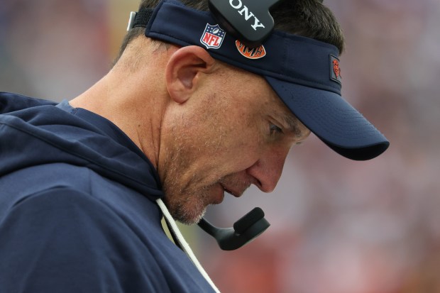 Bears defensive coordinator Dennis Allen reads plays in the second...