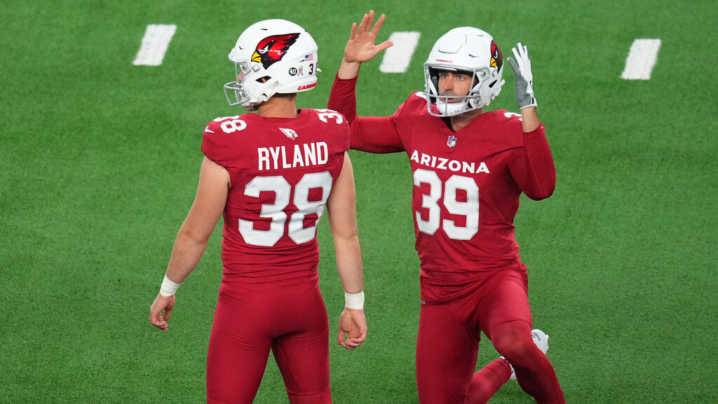 Arizona Cardinals' Chad Ryland (38) looks downfield at his field goal as Pat O'Donnell...