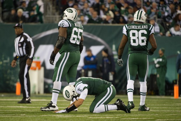 New York Jets quarterback Mark Sanchez fumbles for a Patriots touchdown in the 2nd quarter of a New York Jets game against the New England Patriots at MetLife Stadium on Nov. 22, 2012. (Ron Antonelli / New York Daily News)