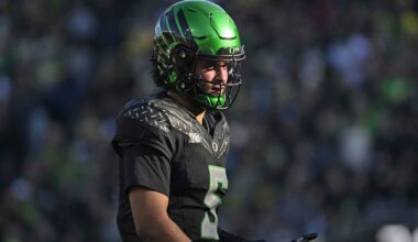 Hurricanes head coach Mario Cristobal signals for his team during the second quarter against the Virginia Tech Hokies at Lane Stadium.