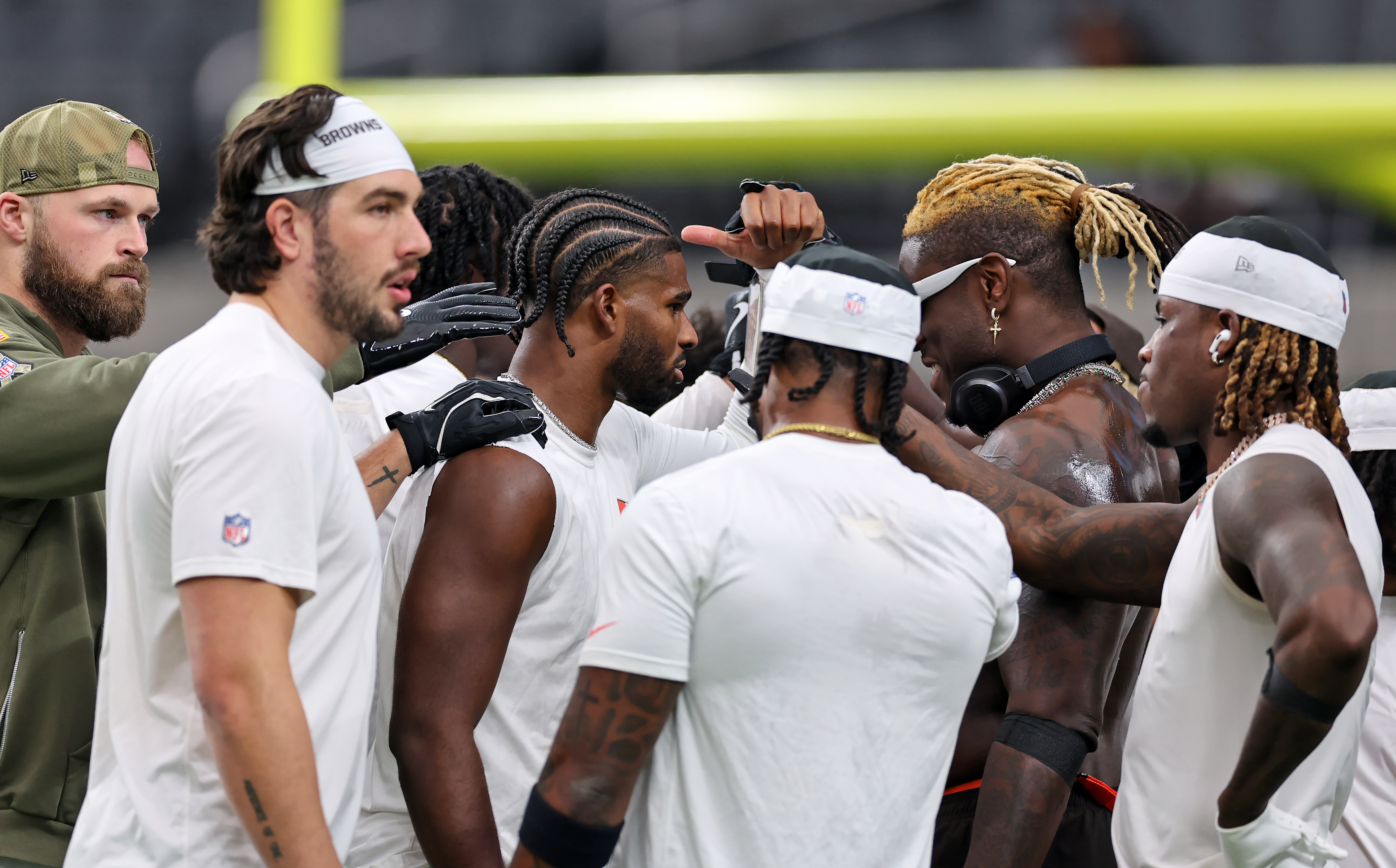 Cleveland Browns quarterback Shedeur Sanders huddles up before the game against the Las Vegas Raiders. 