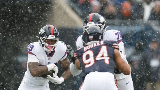 Tyrone Tracy Jr. #29 of the New York Giants carries the ball against the Chicago Bears during the first quarter in the game at Soldier Field on November 09, 2025 in Chicago, Illinois.(Getty Images via AFP)