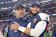 Dallas Cowboys head coach Brian Schottenheimer celebrates with Dallas Cowboys quarterback...