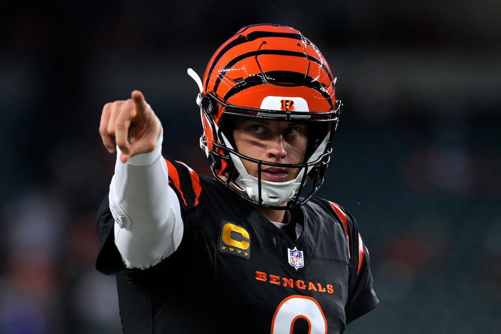Cincinnati Bengals quarterback Joe Burrow warms up before an NFL football game against the...
