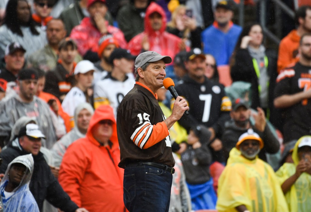Former Cleveland Browns quarterback Bernie Kosar speaks to the crowd during a timeout in the first quarter of a game against the Pittsburgh Steelers on September 9, 2018 at FirstEnergy Stadium in Cleveland, Ohio.
