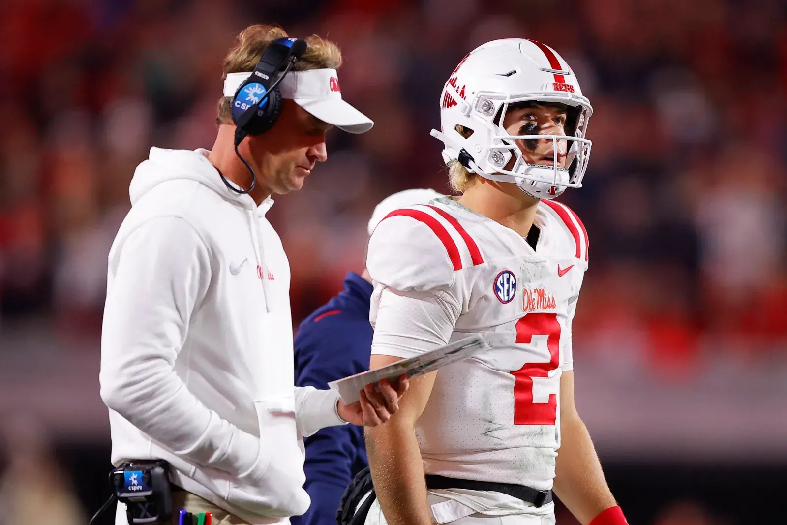 Ole Miss head coach Lane Kiffin and New York Giants QB Jaxson Dart