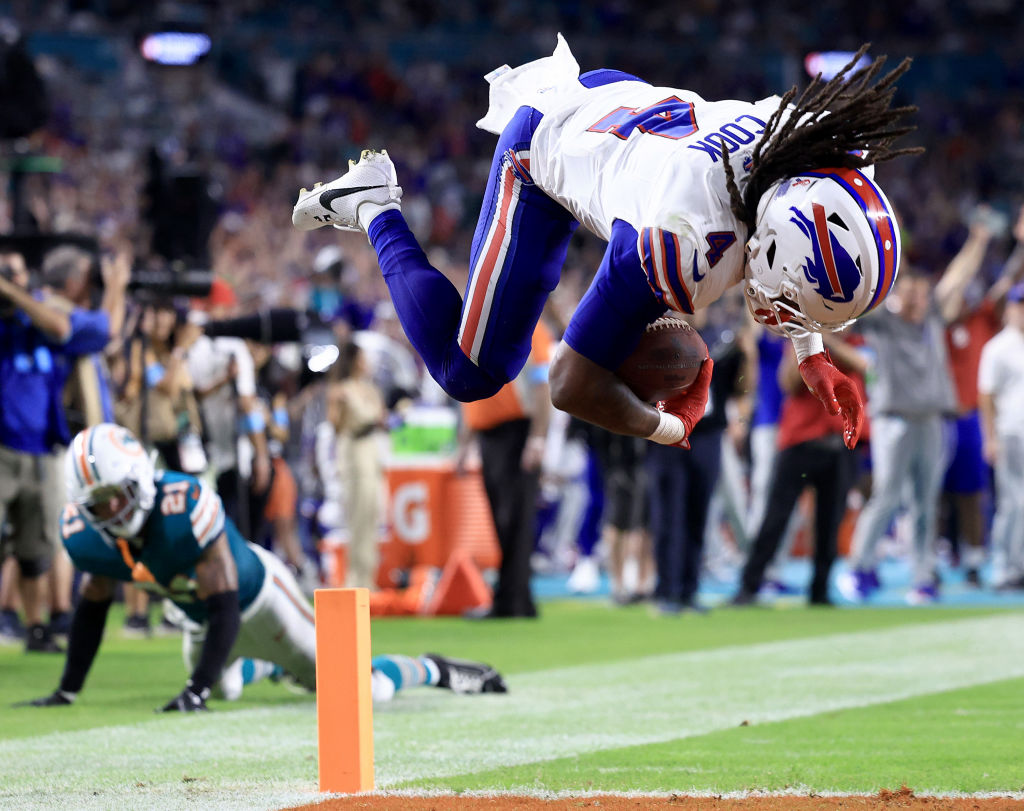 MIAMI GARDENS, FLORIDA - SEPTEMBER 12: James Cook #4 of the Buffalo Bills scores a 49 yard touchdown against the Miami Dolphins during the second quarter in the game at Hard Rock Stadium on September 12, 2024 in Miami Gardens, Florida. (Photo by Carmen Mandato/Getty Images)