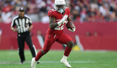 GLENDALE, ARIZONA - JANUARY 05: Michael Carter #22 of the Arizona Cardinals rushes the football during the NFL game at State Farm Stadium on January 05, 2025 in Glendale, Arizona. The Cardinals defeated the 49ers 47-24. (Photo by Christian Petersen/Getty Images)