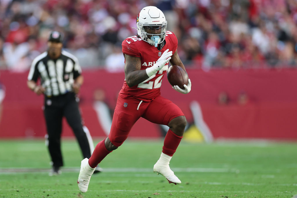 GLENDALE, ARIZONA - JANUARY 05: Michael Carter #22 of the Arizona Cardinals rushes the football during the NFL game at State Farm Stadium on January 05, 2025 in Glendale, Arizona. The Cardinals defeated the 49ers 47-24. (Photo by Christian Petersen/Getty Images)