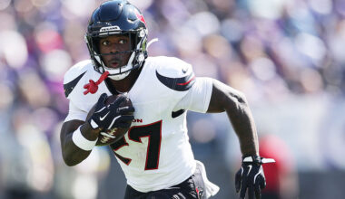 BALTIMORE, MARYLAND - OCTOBER 05: Woody Marks #27 of the Houston Texans carries the ball during the second quarter against the Baltimore Ravens in the game at M&T Bank Stadium on October 05, 2025 in Baltimore, Maryland. (Photo by Patrick Smith/Getty Images)
