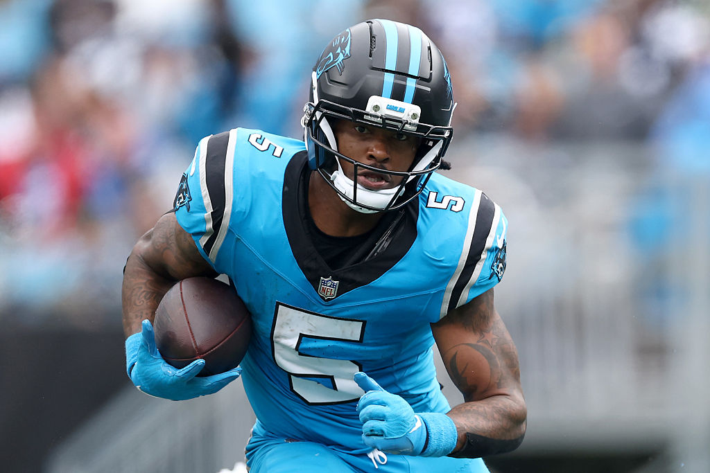 CHARLOTTE, NORTH CAROLINA - OCTOBER 12: Rico Dowdle #5 of the Carolina Panthers carries the ball for yardage during the NFL 2025 game against the Dallas Cowboys at Bank of America Stadium on October 12, 2025 in Charlotte, North Carolina.
