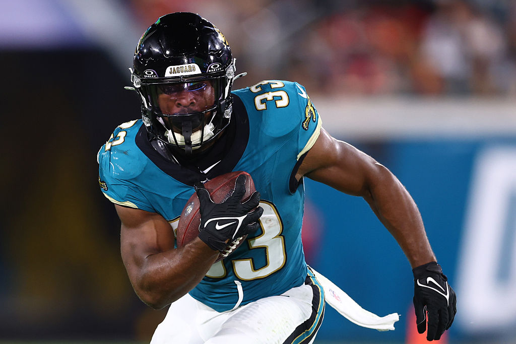 JACKSONVILLE, FLORIDA - OCTOBER 06: Bhayshul Tuten #33 of the Jacksonville Jaguars carries the ball against the Kansas City Chiefs during the first half of the game at EverBank Stadium on October 06, 2025 in Jacksonville, Florida. (Photo by Megan Briggs/Getty Images)
