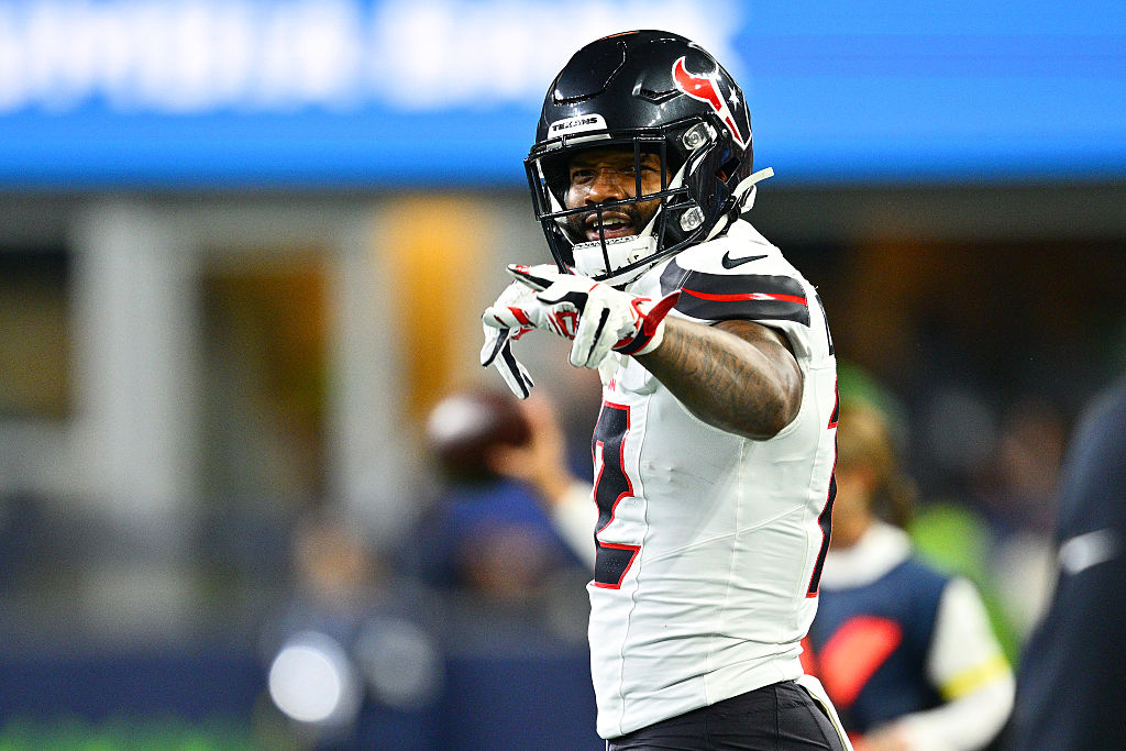 SEATTLE, WASHINGTON - OCTOBER 20: Nico Collins #12 of the Houston Texans reacts against the Seattle Seahawks during the second quarter at Lumen Field on October 20, 2025 in Seattle, Washington. (Photo by Jane Gershovich/Getty Images)