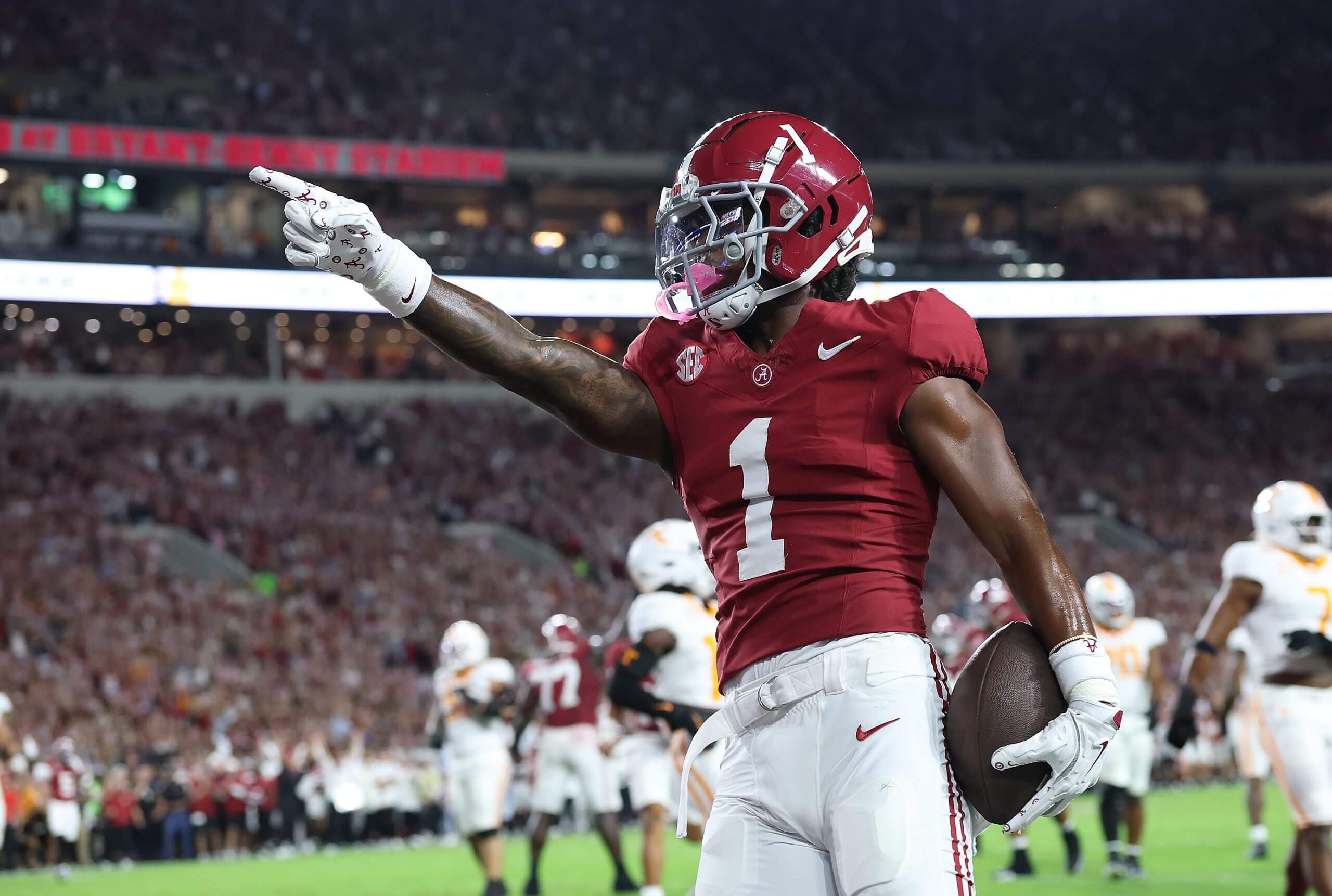Alabama wide receiver Isaiah Horton points and celebrates a touchdown during a game against Tennessee.