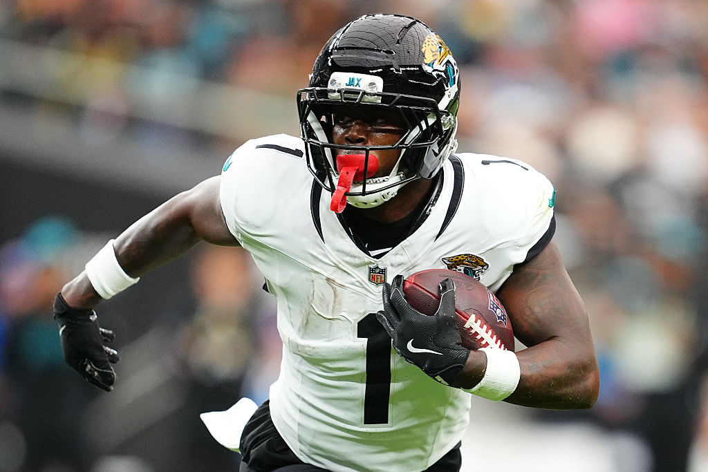 LAS VEGAS, NEVADA - NOVEMBER 02: Travis Etienne #1 of the Jacksonville Jaguars runs with the ball during the first quarter of the game against the Las Vegas Raiders at Allegiant Stadium on November 02, 2025 in Las Vegas, Nevada. (Photo by Chris Unger/Getty Images)