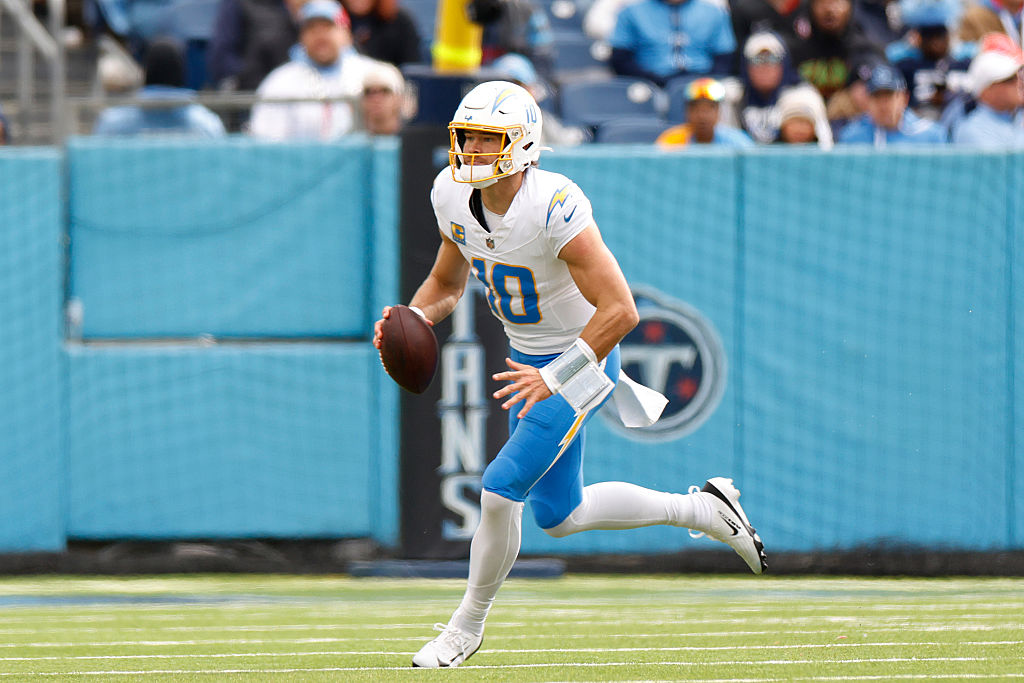 NASHVILLE, TENNESSEE - NOVEMBER 02: Justin Herbert #10 of the Los Angeles Chargers runs the ball during the third quarter of the game against the Tennessee Titans at Nissan Stadium on November 02, 2025 in Nashville, Tennessee. (Photo by Johnnie Izquierdo/Getty Images)