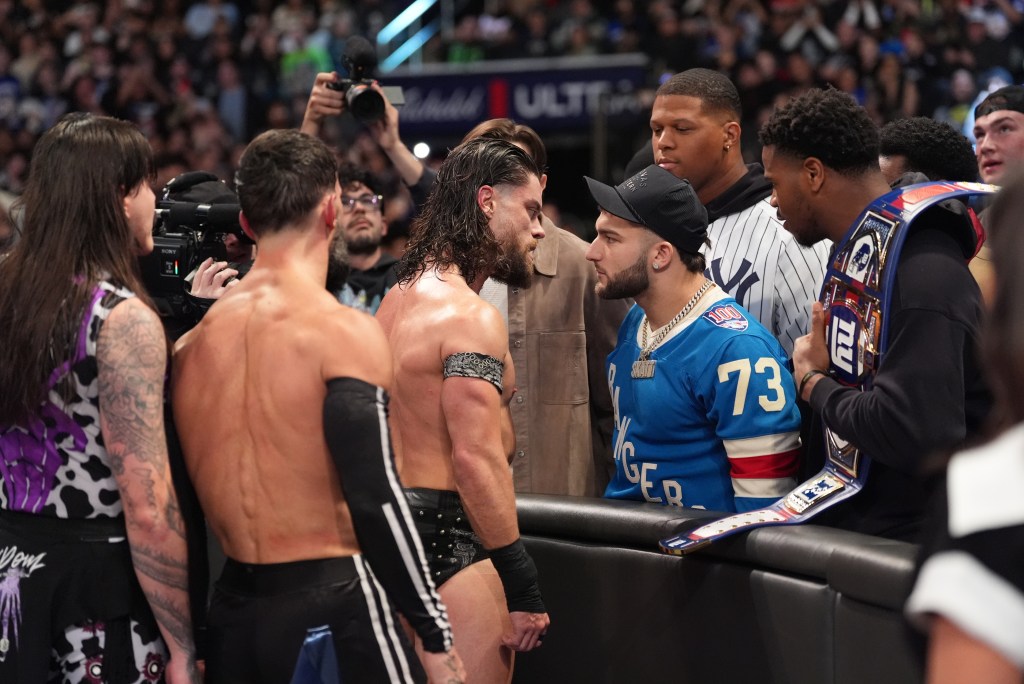 JD McDonagh, Domink Mysterio and Finn Balor confront Andrew Schulz and Cam Skattebo  during Monday Night RAW at Madison Square Garden on November 17, 2025 
