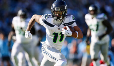 NASHVILLE, TENNESSEE - NOVEMBER 23: Jaxon Smith-Njigba #11 of the Seattle Seahawks runs the ball during the second quarter of an NFL football game against the Tennessee Titans at Nissan Stadium on November 23, 2025 in Nashville, Tennessee. (Photo by Logan Bowles/Getty Images