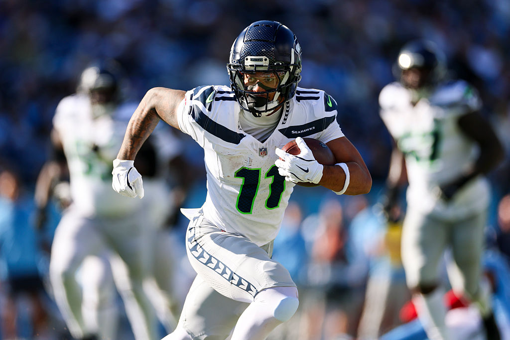 NASHVILLE, TENNESSEE - NOVEMBER 23: Jaxon Smith-Njigba #11 of the Seattle Seahawks runs the ball during the second quarter of an NFL football game against the Tennessee Titans at Nissan Stadium on November 23, 2025 in Nashville, Tennessee. (Photo by Logan Bowles/Getty Images
