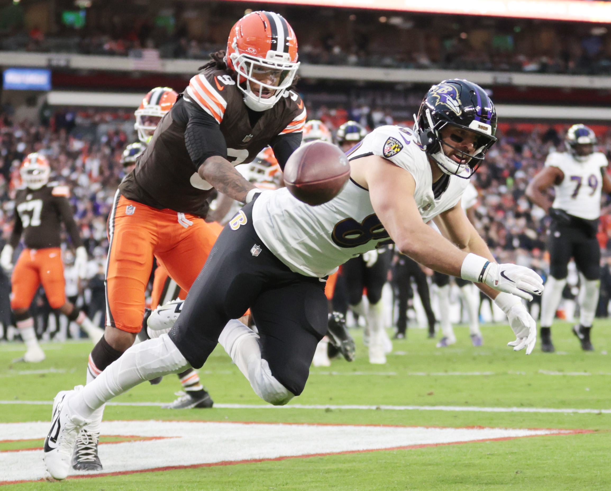 Baltimore Ravens tight end Mark Andrews can’t hold on to a pass in the end zone defended by Cleveland Browns safety Grant Delpit in the first half.  