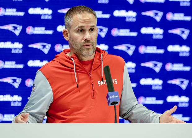 New England Patriots offensive coordinator Josh McDaniels addresses the media during a press conference at Gillette Stadium. (Mark Stockwell/Boston Herald)