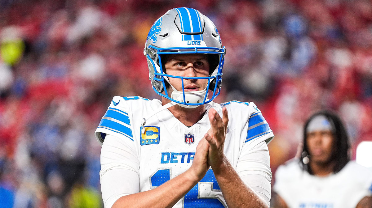 Detroit Lions quarterback Jared Goff (16) cheers for teammates as they get ready to take the field for warm up at Arrowhead Stadium in Kansas City, Missouri on Sunday, Oct. 12, 2025.