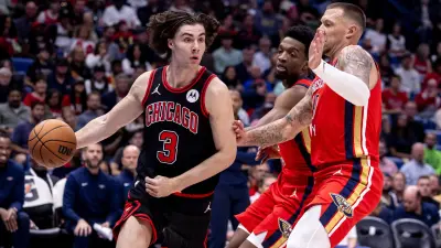 Oct 23, 2024; New Orleans, Louisiana, USA; Chicago Bulls guard Josh Giddey (3) dribbles against New Orleans Pelicans center Daniel Theis (10) during the first half at Smoothie King Center.