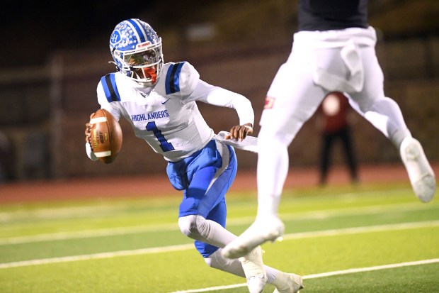La Habra quarterback DJ Mitchell (1) looks for an open...