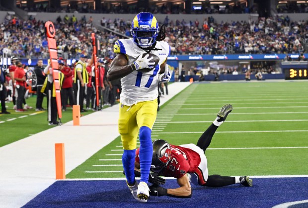 Wide receiver Davante Adams (17) of the Rams catches a...