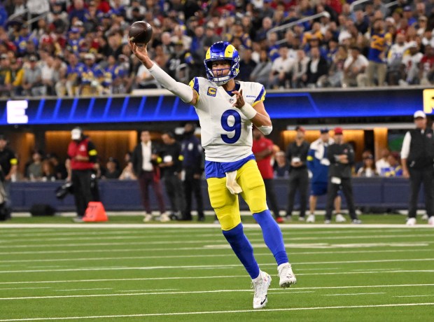 Quarterback Matthew Stafford (9) of the Rams passes against the...