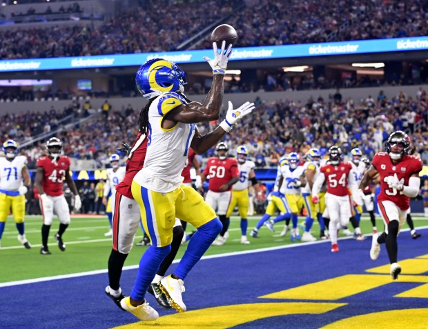 Wide receiver Davante Adams (17) of the Rams catches a...