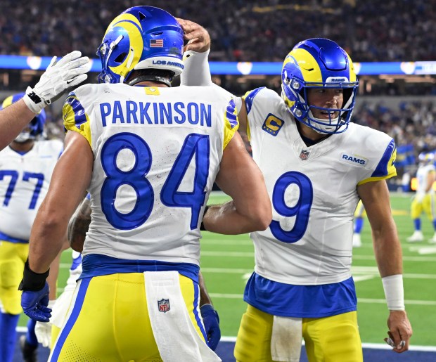 Quarterback Matthew Stafford (9) of the Rams reacts after a...