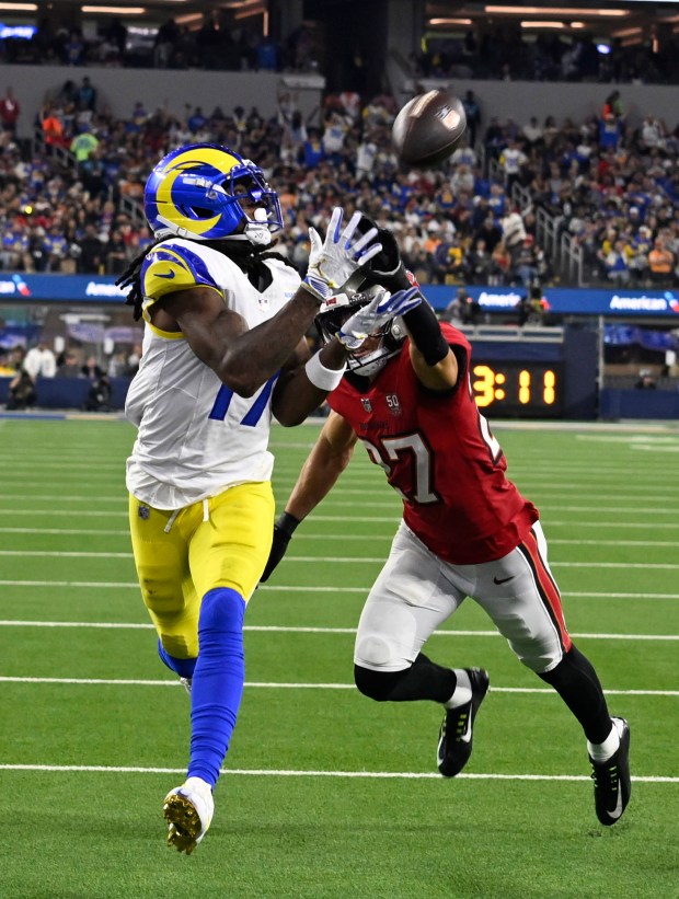 Wide receiver Davante Adams (17) of the Rams catches a...