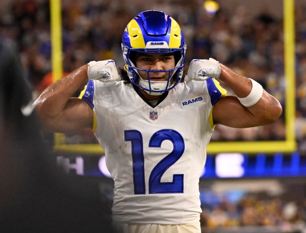 Wide receiver Puka Nacua (12) of the Rams rects after...