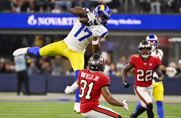 Wide receiver Davante Adams (17) of the Rams catches a...