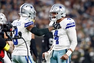 Dallas Cowboys quarterback Dak Prescott (4) reacts after throwing a touchdown to wide...