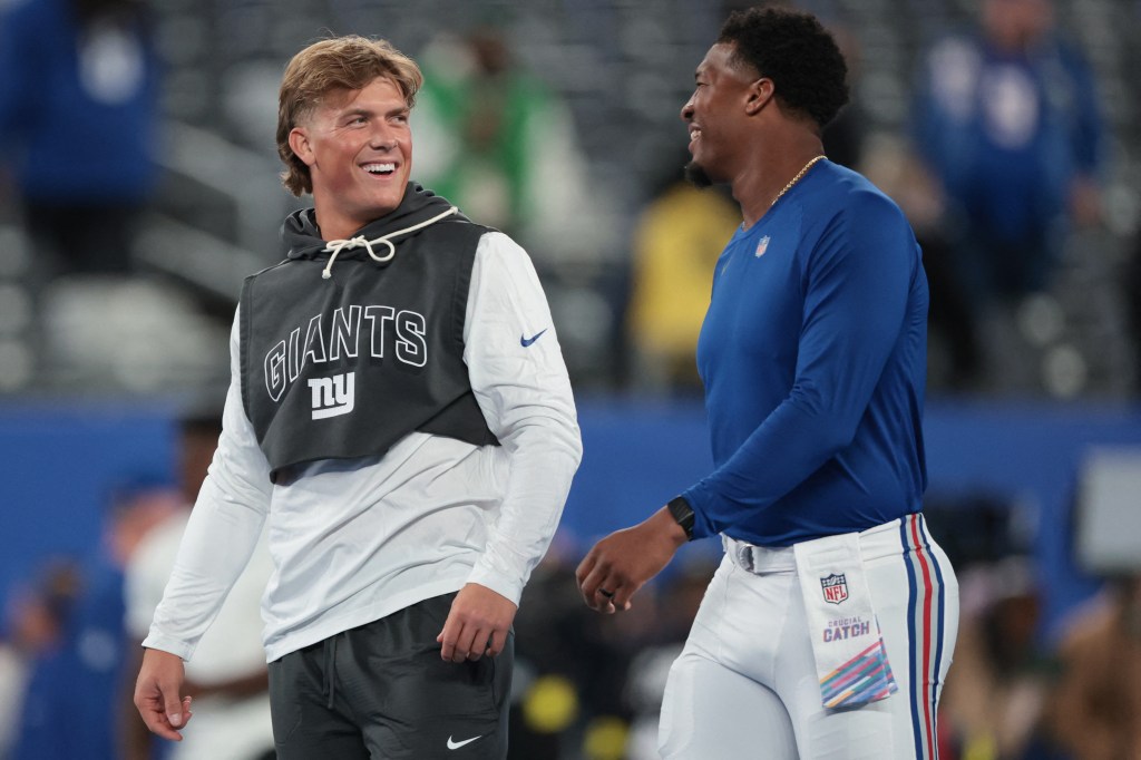 New York Giants quarterback Jaxson Dart, left, and quarterback Jameis Winston.