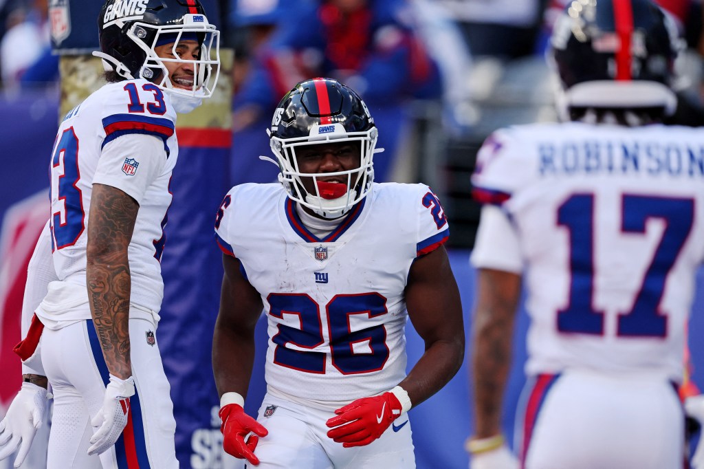 New York Giants players on the field.