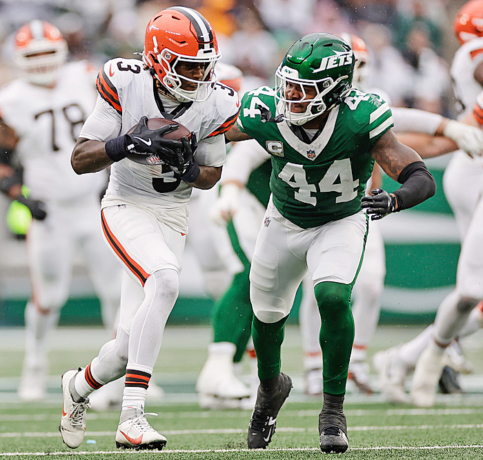Cleveland Browns wide receiver Jerry Jeudy (3) carries as New York Jets linebacker Jamien Sherwood (44) defends in the first half of an NFL football game, Sunday, Nov. 9, 2025, in East Rutherford, N.J.