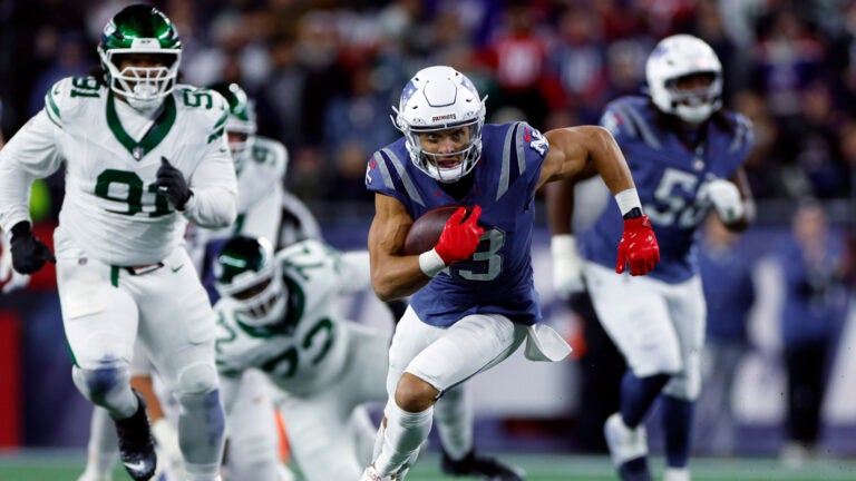 New England Patriots wide receiver Mack Hollins (13) runs with the ball during the second quarter. The New England Patriots played the New York Jets at Gillette Stadium on November 13, 2025.