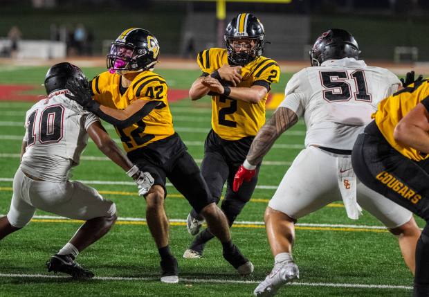 Capistrano Valley's Talon Spencer runs the ball on a quarter back keeper during a game against Capistrano Valley at Saddleback College on Thursday, Oct. 30, 2025. (Photo by Scott Smeltzer/Contributing Photographer)