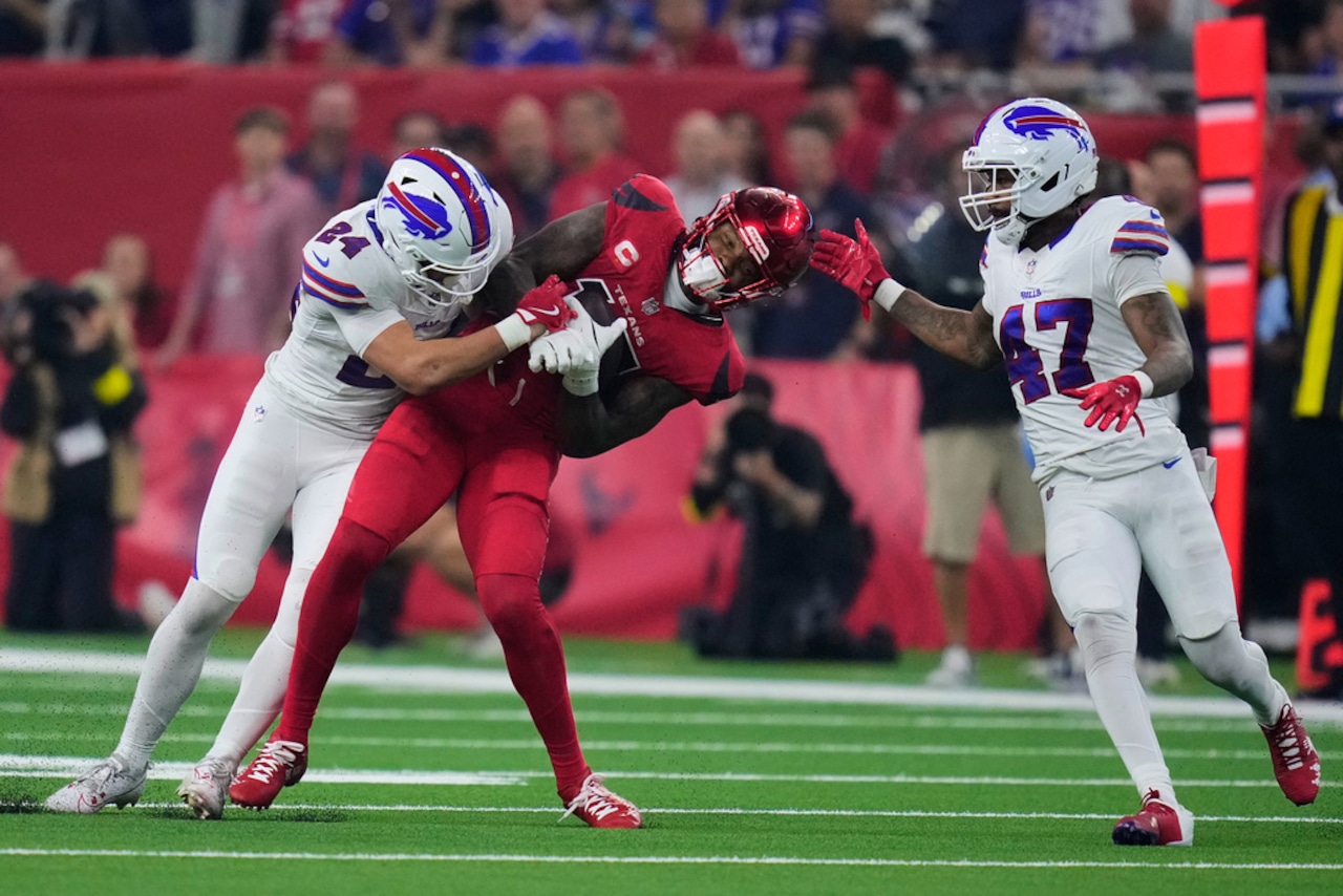 Houston Texans wide receiver Nico Collins holds onto the football for a reception during an NFL game against the Buffalo Bills on Thursday, Nov. 20, 2025, at NRG Stadium in Houston.