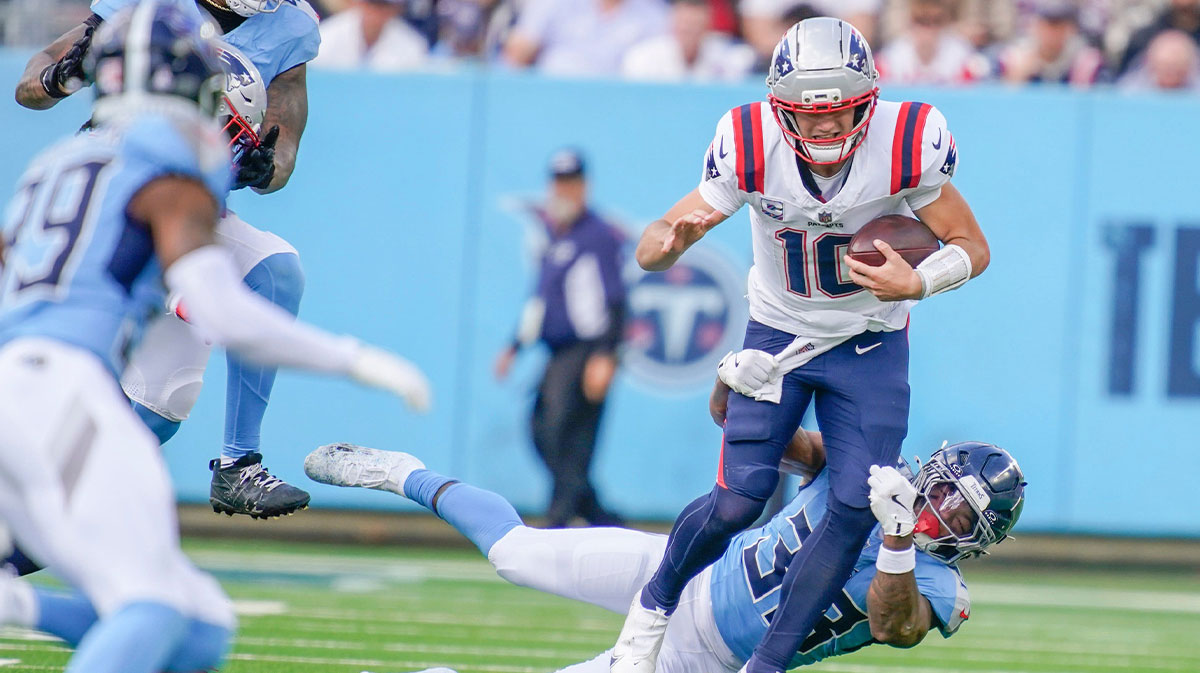New England Patriots quarterback Drake Maye (10) takes down Tennessee Titans linebacker Cedric Gray (33) during the third quarter at Nissan Stadium in Nashville, Tenn., Sunday, Oct. 19, 2025.