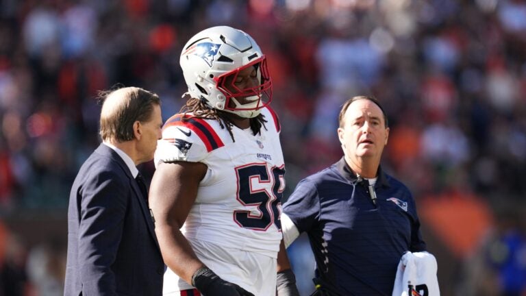 CINCINNATI, OHIO - NOVEMBER 23: Jared Wilson #58 of the New England Patriots is helped off the field during the first quarter against the Cincinnati Bengals at Paycor Stadium on November 23, 2025 in Cincinnati, Ohio.