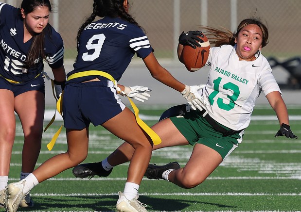 Pajaro Valley High senior Daisy Rincon flies for more yardage during a gain against visiting Notre Dame of San Jose in the first round of the inaugural CCS Division II playoffs on Monday. (Shmuel Thaler - Santa Cruz Sentinel)