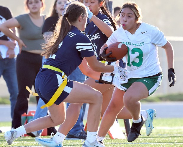 Pajaro Valley High senior Daisy Rincon gains yardage against Notre...