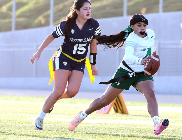 Pajaro Valley High sophomore Leilani English gets past Notre Dame of San Jose defender Catherine Cofre for a gain in the first round of the inaugural CCS D-II playoffs on Monday. (Shmuel Thaler - Santa Cruz Sentinel)