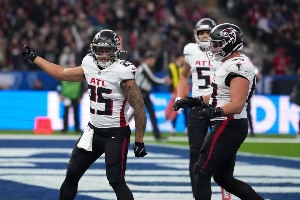Atlanta Falcons running back Tyler Allgeier (25) celebrates after scoring a touchdown against the Indianapolis Colts during an NFL football game in Berlin, Germany, Sunday, Nov. 9, 2025. (Dave Shopland/AP Content Services for the NFL)