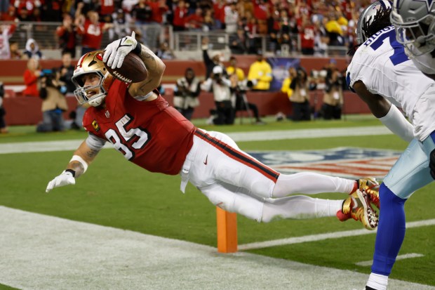George Kittle #85 of the San Francisco 49ers dives for the pylon after a catch and run during the third quarter against the Dallas Cowboys at Levi's Stadium on Oct. 27, 2024 in Santa Clara, California. (Photo by Lachlan Cunningham/Getty Images)